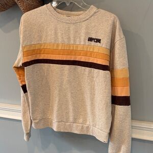 Rip Curl Women’s Oatmeal Crewneck Sweater with Yellow, Orange and Brown Stripes